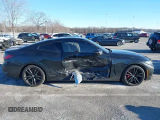 2021 BMW 4 Series M440i xDrive with VIN WBA13AR0XMCF50380, listed as a IAAI auction lot 41200404 with 26,102 mi miles and . Bid and sale history available at DreamBid. Image 13.