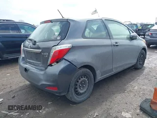 2013 Toyota Yaris L with VIN JTDJTUD30DD568688, listed as a IAAI auction lot 41665697 with 174,007 mi miles. Bid and sale history available at carsss.com. Image 4.