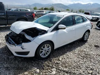 2015 Ford Focus SE with VIN 1FADP3F26FL348356, listed as a Copart auction lot 58084095 with 134,925 mi miles and Salvage title. Bid and sale history available at DreamBid. Image 1.