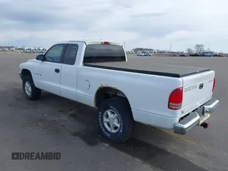1998 Dodge Dakota SLT with VIN 1B7GG22X8WS677553, listed as a IAAI auction lot 41854961 with 167,917 mi miles and . Bid and sale history available at carsss.com. Image 3.