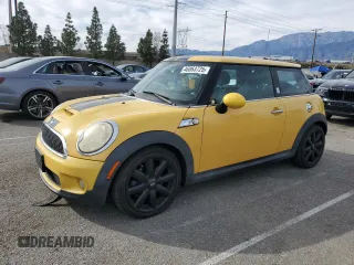 2009 MINI Hardtop S with VIN WMWMF73599TW87679, listed as a Copart auction lot 46863725 with 102,976 mi miles and Salvage title. Bid and sale history available at DreamBid. Image 1.
