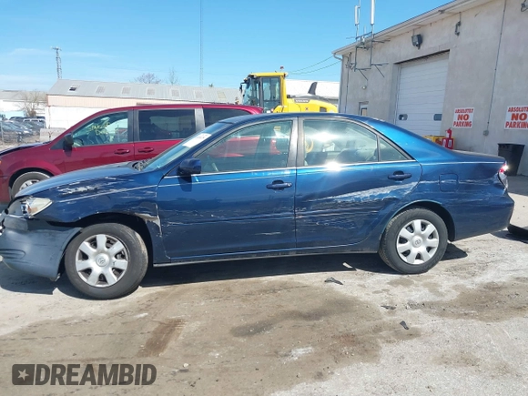 2002 Toyota Camry LE z VIN JTDBE32KX20111362, wystawiony jako IAAI lot #41820475 z przebiegiem 270 091 mil mil oraz . Historia ofert i sprzedaży dostępna na DreamBid. Obrazek 14.