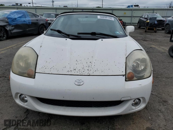 2003 Toyota MR2 z VIN JTDFR320130054491, wystawiony jako Copart lot #58899155 z przebiegiem 62 552 mil mil oraz Szkoda całkowita • Salvage title. Historia ofert i sprzedaży dostępna na DreamBid. Obrazek 5.