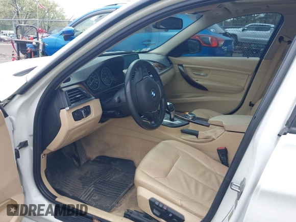 2014 BMW 3 Series 328i xDrive with VIN WBA3B5C56EP544400, listed as a IAAI auction lot 42172100 with 242,472 mi miles. Bid and sale history available at carsss.com. Image 5.