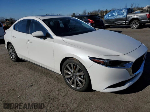 2021 Mazda 3 with VIN JM1BPBDL1M1339693, listed as a Copart auction lot 82402463 with 13,024 mi miles and . Bid and sale history available at DreamBid. Image 4.
