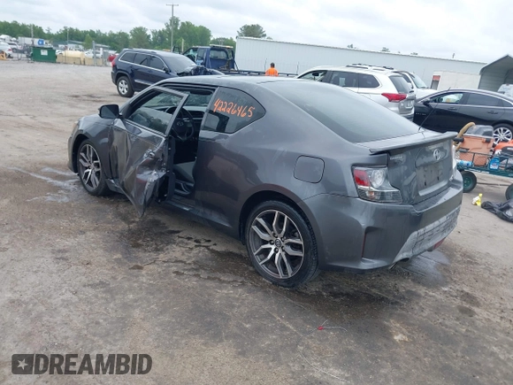 2015 Scion tC z VIN JTKJF5C75F3089895, wystawiony jako IAAI lot #42226465 z przebiegiem 106 694 mil mil oraz . Historia ofert i sprzedaży dostępna na DreamBid. Obrazek 3.