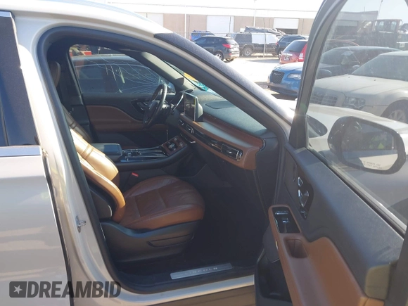 2021 Lincoln Aviator Reserve z VIN 5LM5J7WC6MGL12195, wystawiony jako IAAI lot #42159567 z przebiegiem 95 199 mil mil oraz . Historia ofert i sprzedaży dostępna na DreamBid. Obrazek 5.