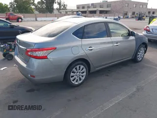 2014 Nissan Sentra SV with VIN 3N1AB7AP9EY242028, listed as a IAAI auction lot 42665433 with 191,906 mi miles and . Bid and sale history available at DreamBid. Image 4.