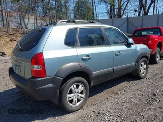2006 Hyundai Tucson GLS with VIN KM8JN12D06U285856, listed as a IAAI auction lot 42112640 with 157,016 mi miles. Bid and sale history available at carsss.com. Image 4.