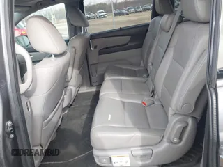 2016 Honda Odyssey Touring Elite z VIN 5FNRL5H99GB072860, wystawiony jako IAAI lot #42157603 z przebiegiem 221 449 mil mil oraz . Historia ofert i sprzedaży dostępna na DreamBid. Obrazek 8.