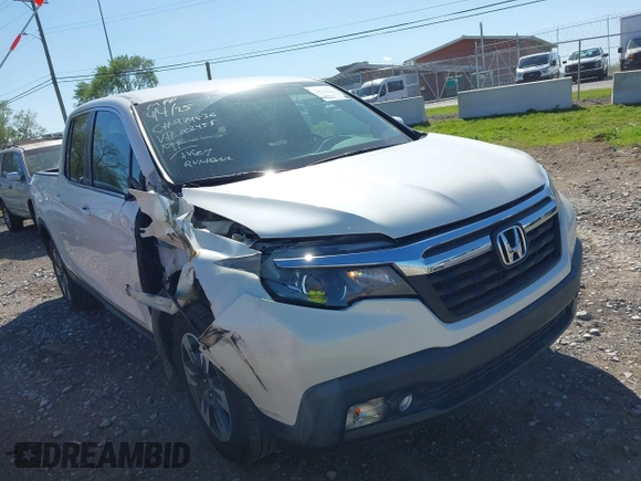 2017 Honda Ridgeline RTL with VIN 5FPYK2F55HB002455, listed as a IAAI auction lot 42032551 with 115,178 mi miles and . Bid and sale history available at DreamBid. Image 6.