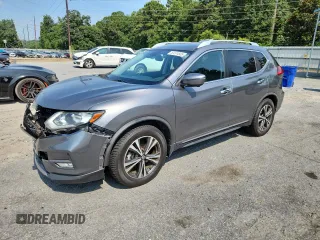 2017 Nissan Rogue SV с VIN JN8AT2MT4HW148984, выставлен на аукционе Copart как лот 62374565 с пробегом 150 032 миль миль и Списание • Salvage title. История ставок и продаж доступна на DreamBid. Изображение 1.