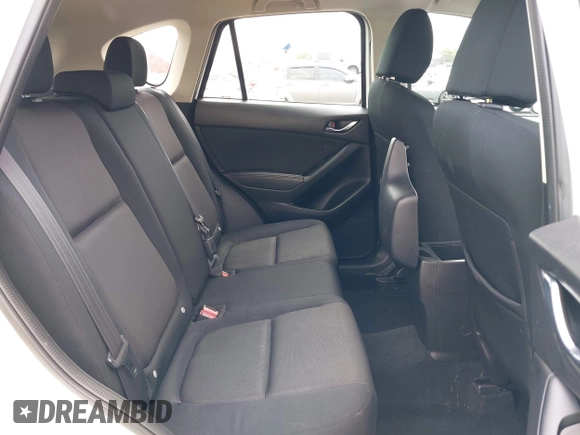 2016 Mazda CX-5 Sport with VIN JM3KE4BY7G0764563, listed as a IAAI auction lot 42279993 with 128,950 mi miles and . Bid and sale history available at DreamBid. Image 8.