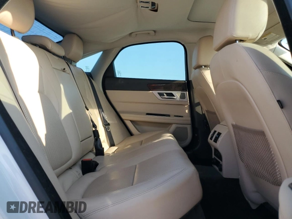 2016 Jaguar XF 35t Prestige with VIN SAJBE4BV5GCY16769, listed as a Copart auction lot 76058864 with 122,649 mi miles and Salvage Title. Bid and sale history available at carsss.com. Image 10.