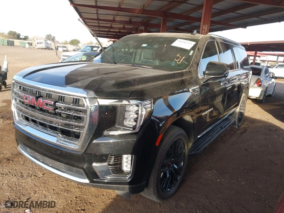 2024 GMC Yukon XL SLT with VIN 1GKS2GKD2RR157523, listed as a IAAI auction lot 41600219 with 52,444 mi miles. Bid and sale history available at carsss.com. Image 18.