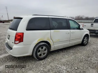 2012 Dodge Grand Caravan SXT with VIN 2C4RDGCG7CR364598, listed as a Copart auction lot 81848314 with 173,022 mi miles and Non Repairable. Bid and sale history available at DreamBid. Image 3.