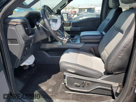 2022 Ford F-150 Lightning Pro z VIN 1FT6W1EV8NWG04113, wystawiony jako Copart lot #57489635 z przebiegiem 48 990 mil mil oraz Szkoda całkowita • Salvage title. Historia ofert i sprzedaży dostępna na DreamBid. Obrazek 7.