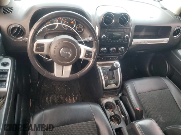 2016 Jeep Compass Latitude with VIN 1C4NJDEB1GD758128, listed as a Copart auction lot 88362015 with 111,411 mi miles and Salvage Title. Bid and sale history available at carsss.com. Image 8.
