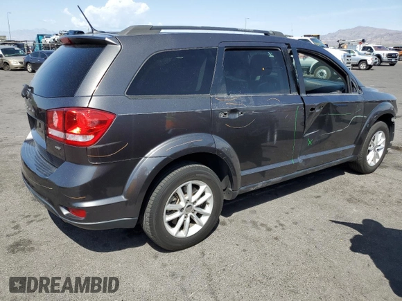2017 Dodge Journey SXT with VIN 3C4PDCBB5HT701487, listed as a Copart auction lot 58821045 with 118,585 mi miles and Salvage title. Bid and sale history available at DreamBid. Image 3.