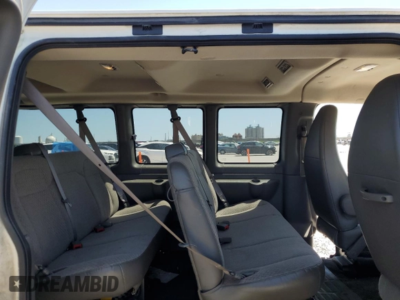 2013 Chevrolet Express Passenger LT with VIN 1GAZG1FG0D1189819, listed as a Copart auction lot 51945455 with 101,364 mi miles and Salvage title. Bid and sale history available at DreamBid. Image 11.