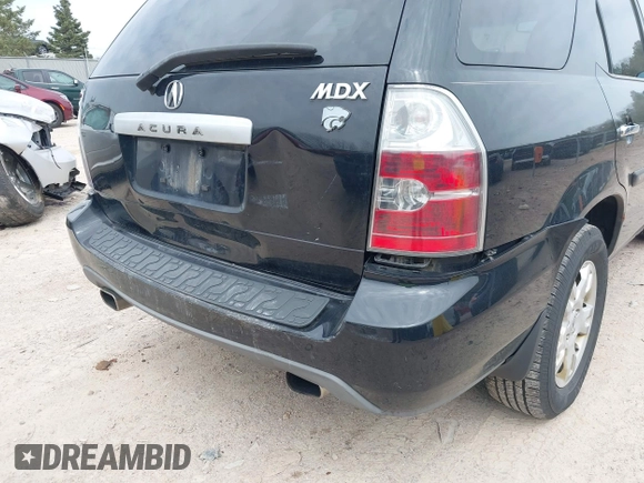 2004 Acura MDX Touring Pkg with VIN 2HNYD18694H551917, listed as a IAAI auction lot 42130100 with 207,699 mi miles. Bid and sale history available at carsss.com. Image 12.