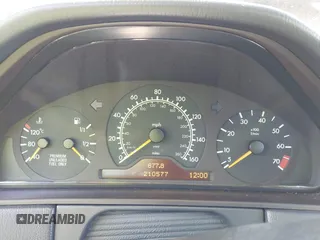 1997 Mercedes-Benz E 320 with VIN WDBJF55F7VA402305, listed as a IAAI auction lot 41865470 with 210,577 mi miles and . Bid and sale history available at DreamBid. Image 7.