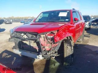 2018 Toyota 4Runner SR5 with VIN JTEBU5JR7J5607357, listed as a IAAI auction lot 40991420 with 115,769 mi miles. Bid and sale history available at carsss.com. Image 2.