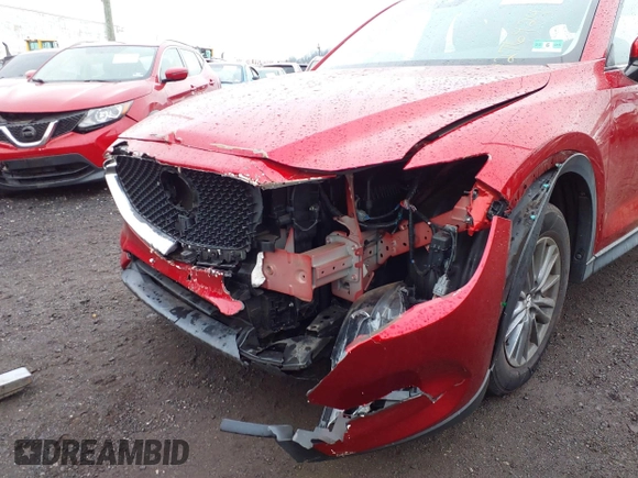 2019 Mazda CX-5 Sport with VIN JM3KFBBM7K1574764, listed as a IAAI auction lot 41276424 with 28,901 mi miles and . Bid and sale history available at carsss.com. Image 6.
