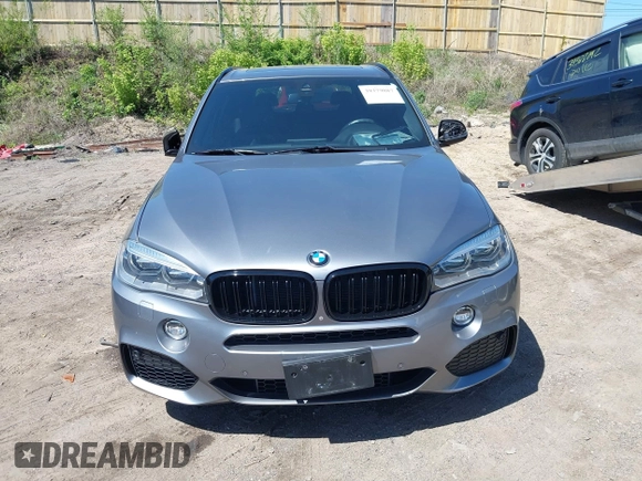 2014 BMW X5 xDrive50i with VIN 5UXKR6C57E0J72301, listed as a IAAI auction lot 39379887 with 117,012 mi miles. Bid and sale history available at carsss.com. Image 12.