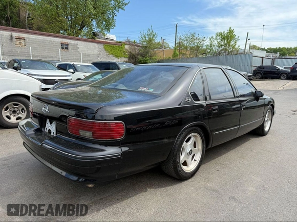 1994 Chevrolet Caprice LS with VIN 1G1BN52P2RR126654, listed as a IAAI auction lot 42166452 with 203,299 mi miles and . Bid and sale history available at DreamBid. Image 4.