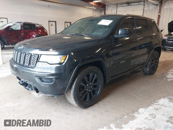 2017 Jeep Grand Cherokee Laredo with VIN 1C4RJFAG3HC841307, listed as a IAAI auction lot 42326035 with 132,655 mi miles and . Bid and sale history available at DreamBid. Image 17.