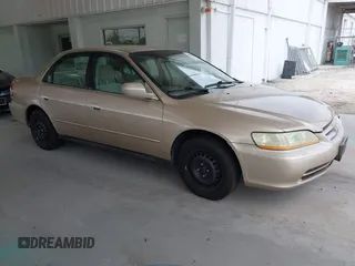 2002 Honda Accord LX z VIN 1HGCG56452A135666, wystawiony jako IAAI lot #42436949 z przebiegiem 103 652 mil mil oraz . Historia ofert i sprzedaży dostępna na DreamBid. Obrazek 1.