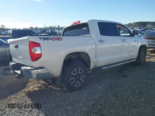 2014 Toyota Tundra 4WD Truck LTD with VIN 5TFHW5F16EX372679, listed as a IAAI auction lot 41736049 with 247,000 mi miles. Bid and sale history available at carsss.com. Image 4.