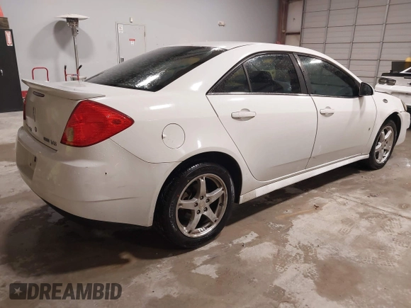 2009 Pontiac G6 1SB z VIN 1G2ZJ57K494243961, wystawiony jako IAAI lot #41560966 z przebiegiem 210 819 mil mil oraz . Historia ofert i sprzedaży dostępna na DreamBid. Obrazek 4.
