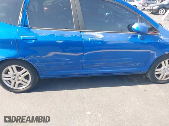 2007 Honda Fit Sport z VIN JHMGD38637S015957, wystawiony jako IAAI lot #42284728 z przebiegiem 176 383 mil mil oraz . Historia ofert i sprzedaży dostępna na DreamBid. Obrazek 6.