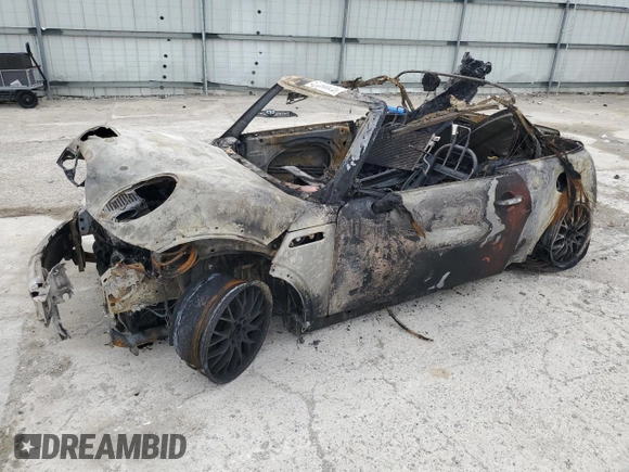 2006 MINI Convertible S with VIN WMWRH33536TK59031, listed as a Copart auction lot 51598825 with Not provided miles and Salvage title. Bid and sale history available at DreamBid. Image 1.