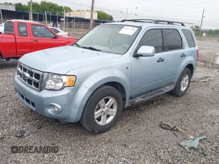 2008 Ford Escape Hybrid with VIN 1FMCU59H08KC38014, listed as a IAAI auction lot 42304980 with 211,671 mi miles and . Bid and sale history available at DreamBid. Image 2.