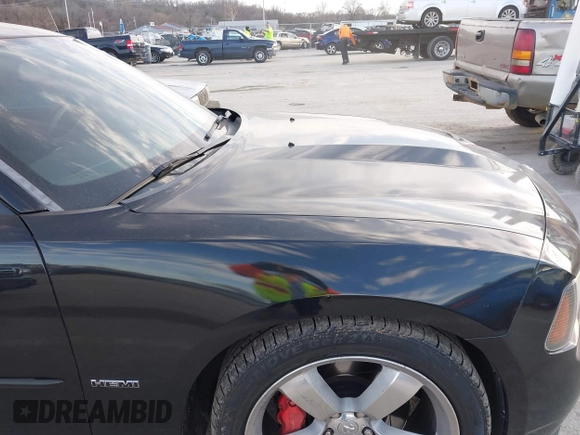 2006 Dodge Charger SRT-8 with VIN 2B3LA73W96H371246, listed as a IAAI auction lot 41676168 with 130,064 mi miles and . Bid and sale history available at carsss.com. Image 18.