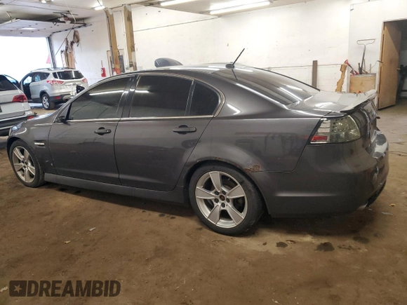 2009 Pontiac G8 z VIN 6G2ER57739L205634, wystawiony jako Copart lot #58935145 z przebiegiem 181 490 mil mil oraz Czysty tytuł • Clean title. Historia ofert i sprzedaży dostępna na DreamBid. Obrazek 2.