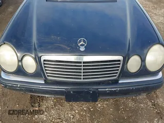 1999 Mercedes-Benz E-Class with VIN WDBJF65H1XA817789, listed as a IAAI auction lot 41818511 with 999,999 mi miles. Bid and sale history available at carsss.com. Image 10.
