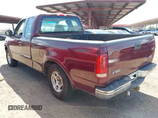 1997 Ford F-150 z VIN 2FTDX18WXVCA51615, wystawiony jako IAAI lot #42425367 z przebiegiem 160 402 mil mil oraz . Historia ofert i sprzedaży dostępna na DreamBid. Obrazek 3.