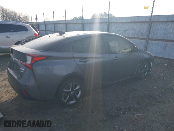 2021 Toyota Prius L Eco z VIN JTDKAMFU1M3149965, wystawiony jako IAAI lot #38641916 z przebiegiem 69 942 mil mil oraz . Historia ofert i sprzedaży dostępna na DreamBid. Obrazek 4.