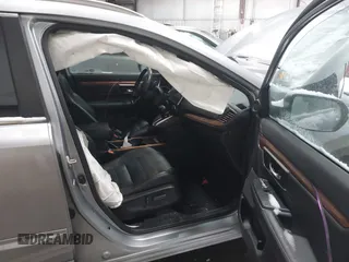 2020 Honda CR-V Touring with VIN 7FARW2H96LE000275, listed as a IAAI auction lot 41600759 with 78,078 mi miles and . Bid and sale history available at DreamBid. Image 5.