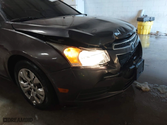 2014 Chevrolet Cruze LS with VIN 1G1PB5SH5E7460979, listed as a IAAI auction lot 41312075 with 123,580 mi miles. Bid and sale history available at carsss.com. Image 6.