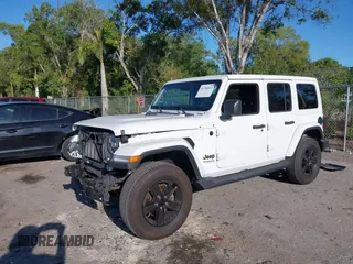 2020 Jeep Wrangler Unlimited Sahara High Altitude with VIN 1C4HJXEG7LW259911, listed as a IAAI auction lot 41786013 with 47,936 mi miles and . Bid and sale history available at DreamBid. Image 2.