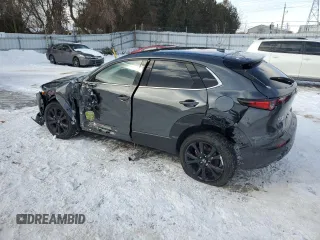 2024 Mazda CX-30 Premium z VIN 3MVDMBDYXRM646995, wystawiony jako Copart lot #89282365 z przebiegiem 4049 mil mil oraz Szkoda całkowita • Salvage title. Historia ofert i sprzedaży dostępna na DreamBid. Obrazek 2.