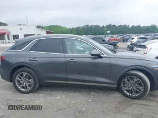 2023 Genesis GV70 2.5T z VIN KMUMADTB7PU103287, wystawiony jako IAAI lot #42112852 z przebiegiem 27 535 mil mil oraz . Historia ofert i sprzedaży dostępna na DreamBid. Obrazek 13.