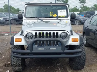 2004 Jeep Wrangler Sport with VIN 1J4FA49S44P772575, listed as a IAAI auction lot 42512876 with 226,387 mi miles and . Bid and sale history available at DreamBid. Image 13.