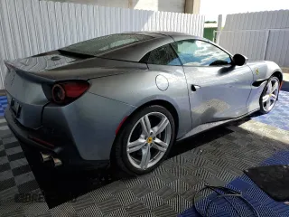 2021 Ferrari Portofino z VIN ZFF89FPA0M0259248, wystawiony jako Copart lot #43380195 z przebiegiem 6175 mil mil oraz Nie do naprawy. Historia ofert i sprzedaży dostępna na DreamBid. Obrazek 3.