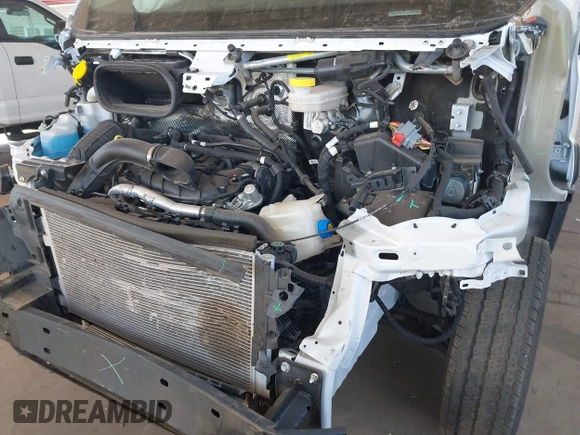 2023 Ram ProMaster Cargo with VIN 3C6LRVDG9PE571633, listed as a IAAI auction lot 41849318 with 23,554 mi miles. Bid and sale history available at carsss.com. Image 6.
